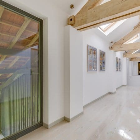 Upstairs gite hallway with exposed beams