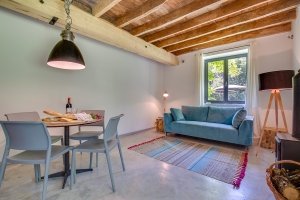 Separate gite apartment lounge with dining area