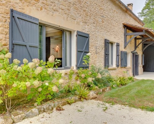 Gite exterior wall with interior view