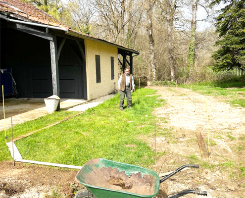 Our local expert helping to prepare the petanque court