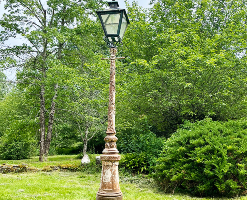 Garden Narnia lamppost before restoration