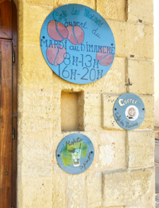 Cafe sign in Cadouin
