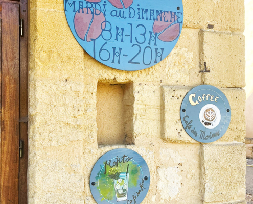 Cafe sign in Cadouin