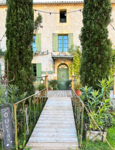 Ornate entrance to a shop in Cadouin, Perigord