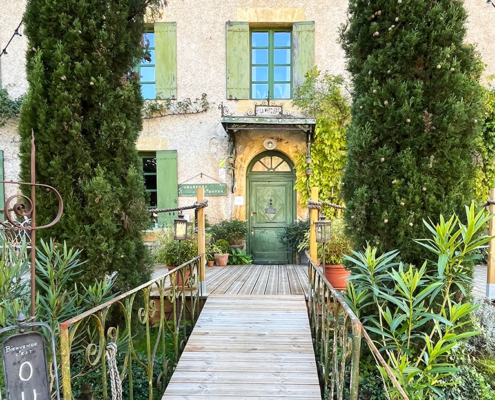 Ornate entrance to a shop in Cadouin, Perigord