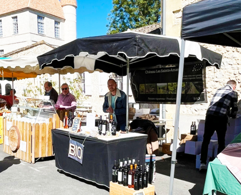 Wine stall at Issigeac market in the Dordogne