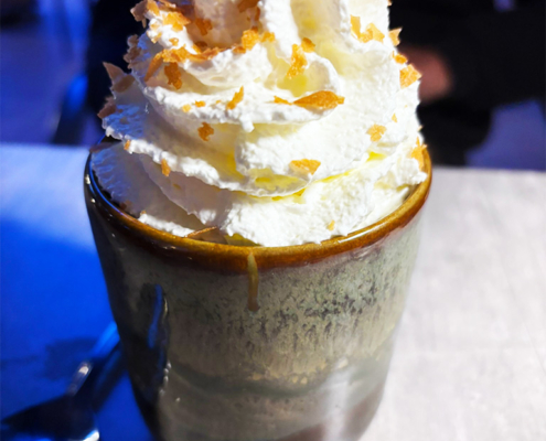 Beautiful creme dessert with spoon