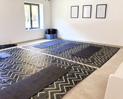Variety of gym equipment available in the yoga room