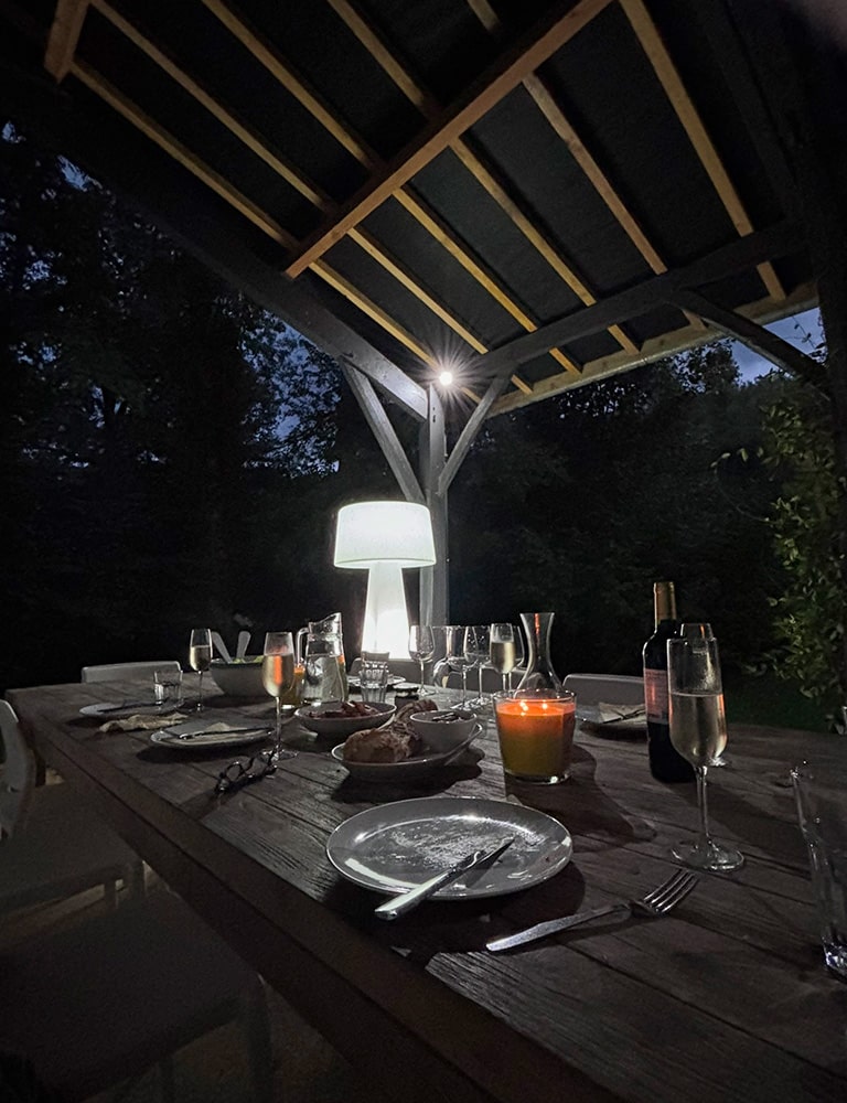 Relaxing by the BBQ An evening barbecue on the terrace at the gite