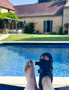 Resting a broken foot Resting a broken foot by the Fontalbe gite pool
