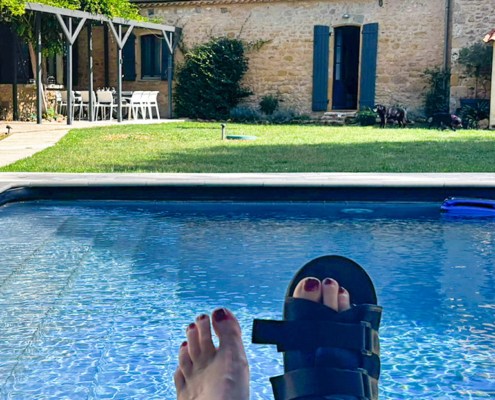 Resting a broken foot Resting a broken foot by the Fontalbe gite pool